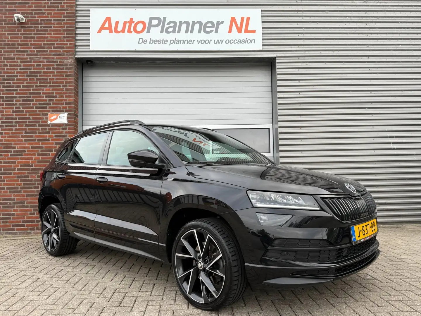 Skoda Karoq 1.5 TSI ACT Sportline! Camera! Navi! Virtual! Zwart - 1