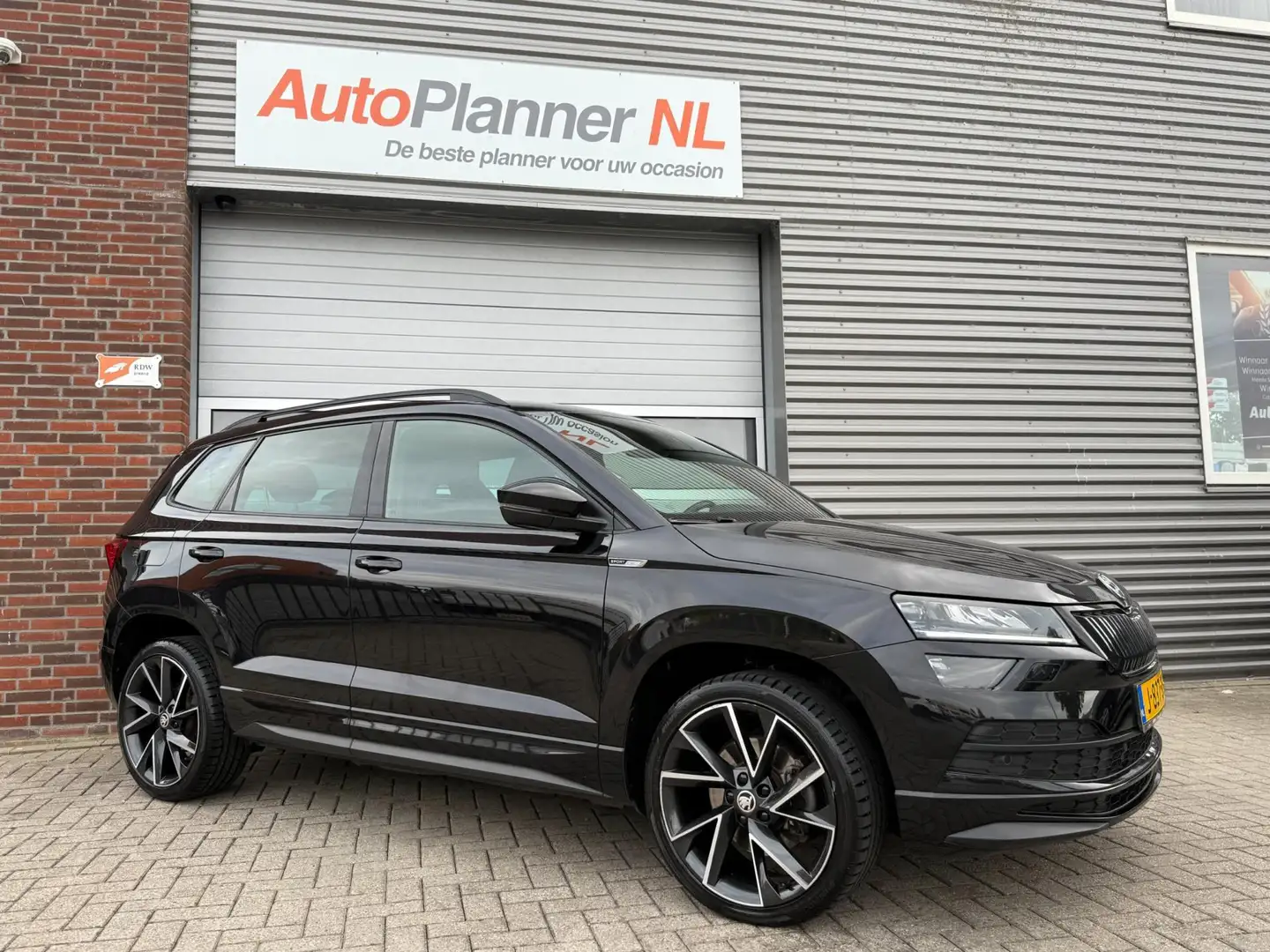 Skoda Karoq 1.5 TSI ACT Sportline! Camera! Navi! Virtual! Zwart - 2