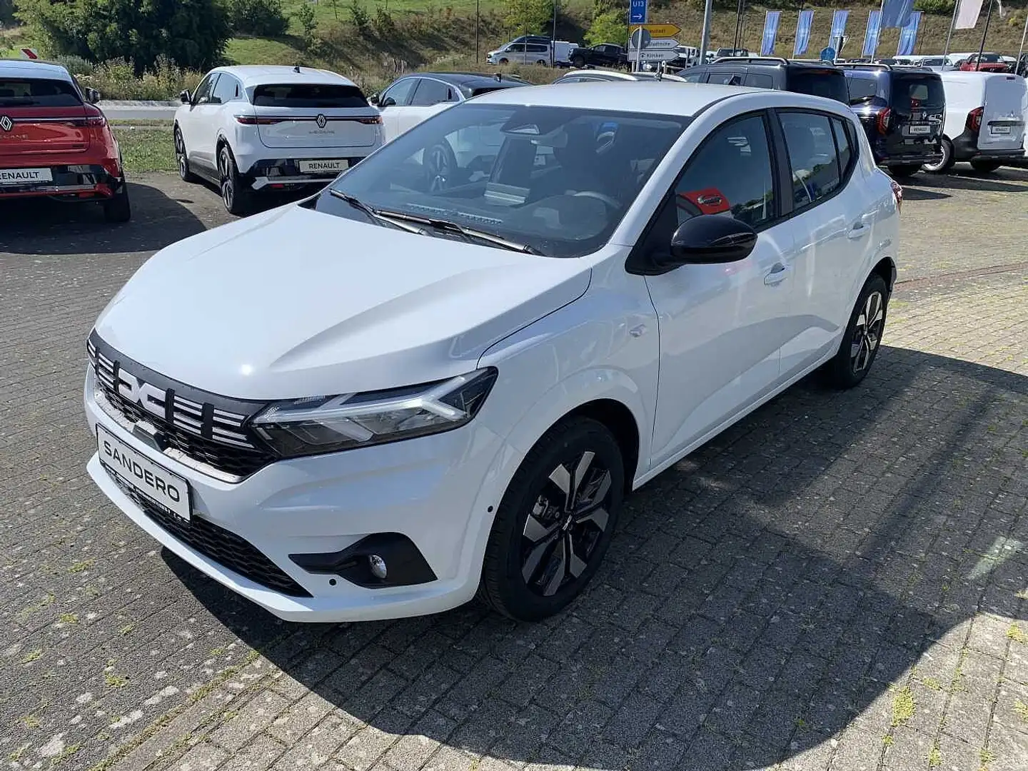 Dacia Sandero Journey TCe 90  Klimatr. Navi SHZ PDC+Kamera 16' Weiß - 1