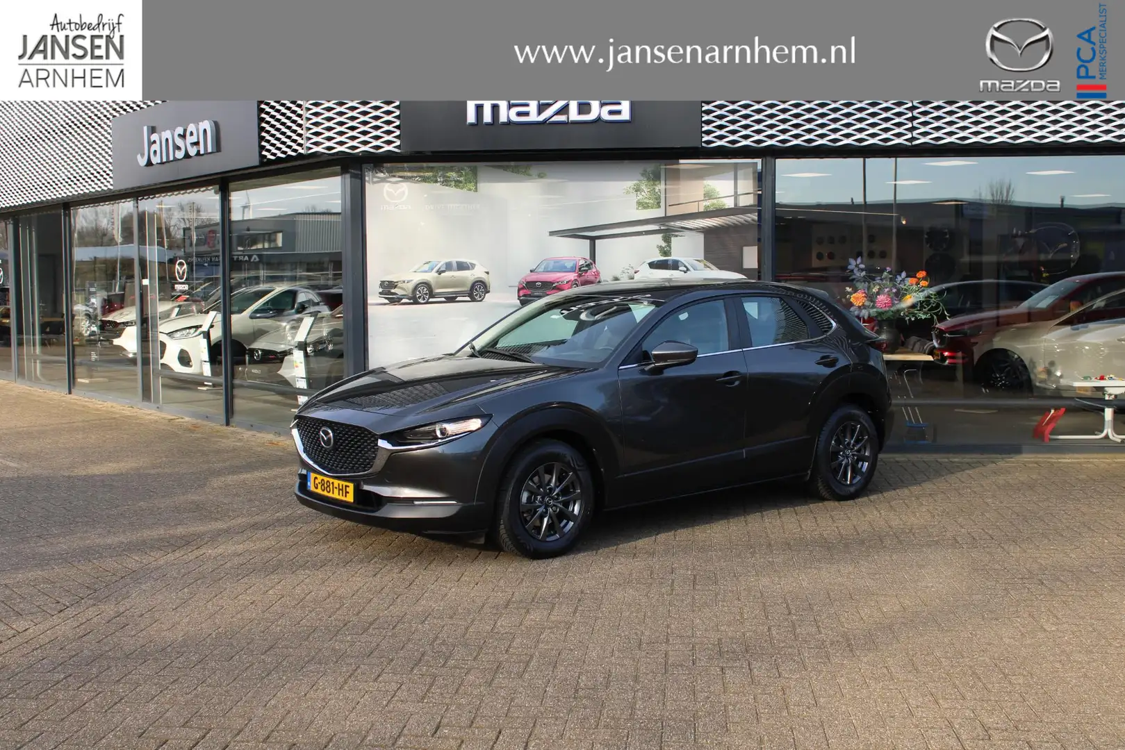 Mazda CX-30 2.0 e-SkyActiv-G 122 M Hybrid Comfort + Leder , Tr Grijs - 1