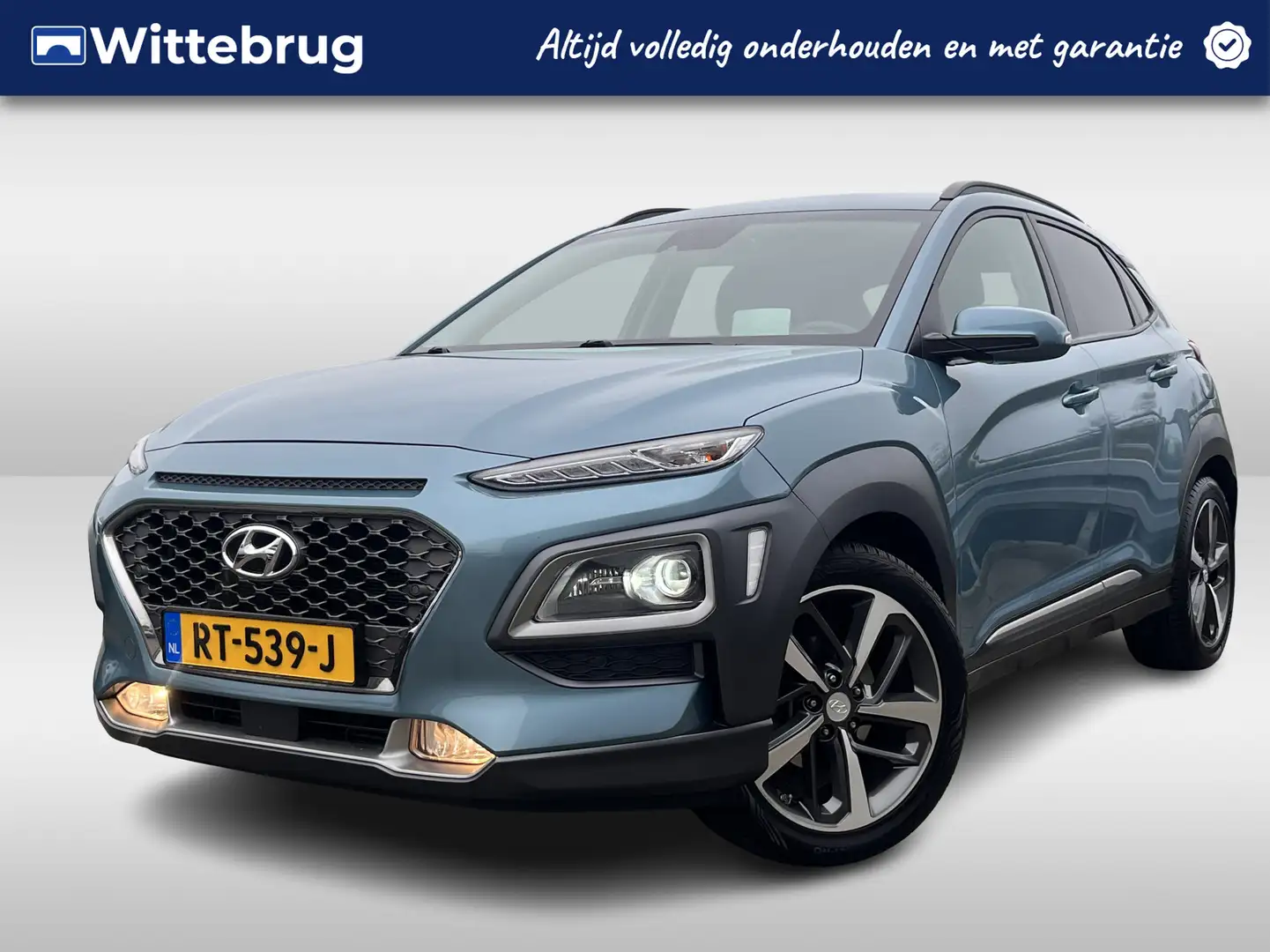 Hyundai KONA 1.0T Premium Luxe uitvoering | Zuinig | Climate Co Blau - 1