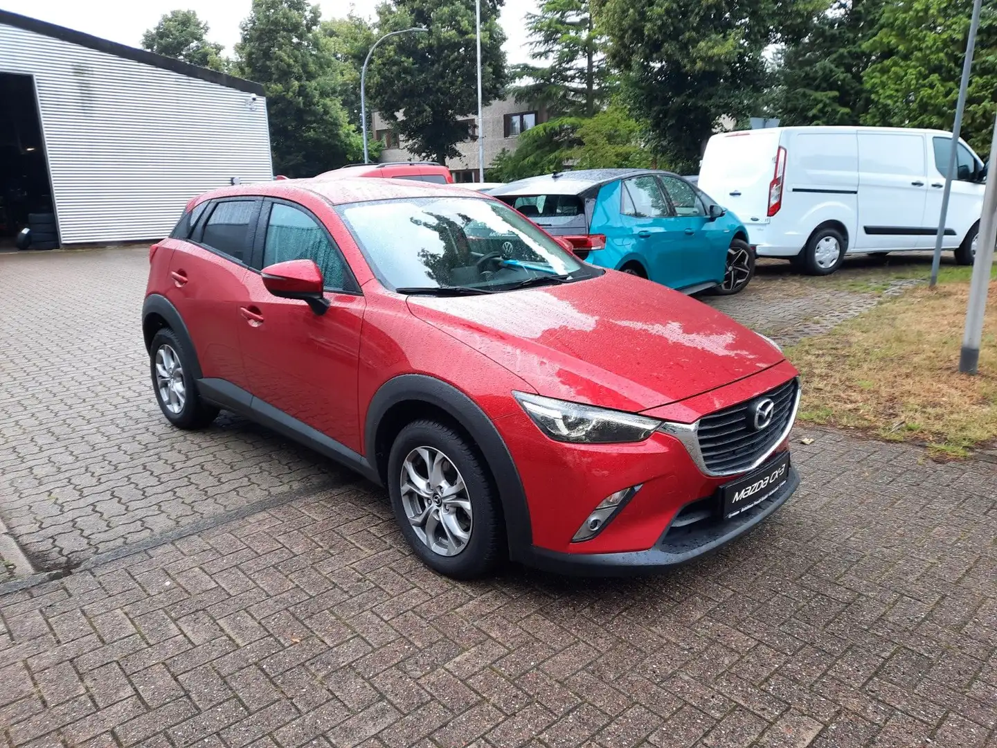 Mazda CX-3 Automatik Exclusive Ganzjahresreifen+Navi crvena - 1