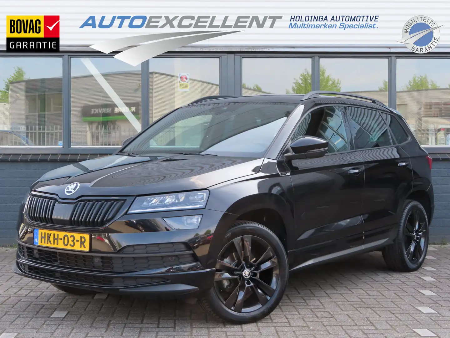 Skoda Karoq 1.5 TSi- DSG Sportline Business | verwarmde voorst Noir - 1