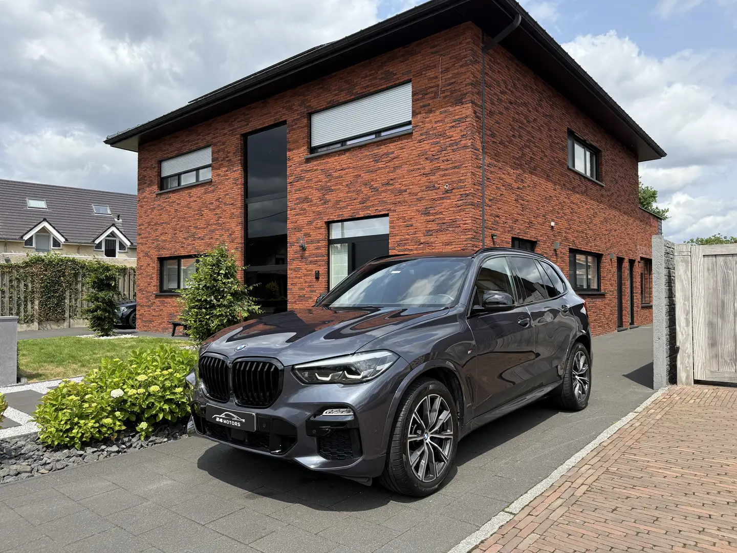 BMW X5 xdrive M-pakket pano headup harman kardon trekhaak Gris - 1