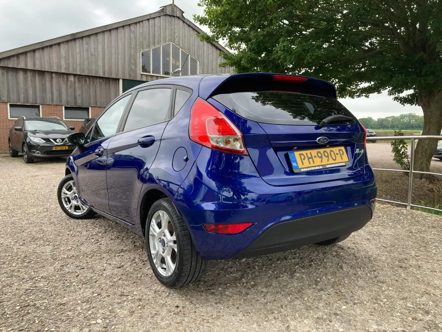 Ford Fiesta 1.0 Style Essential | Cruise + Navi + Airco nu € 6 Blauw - 2