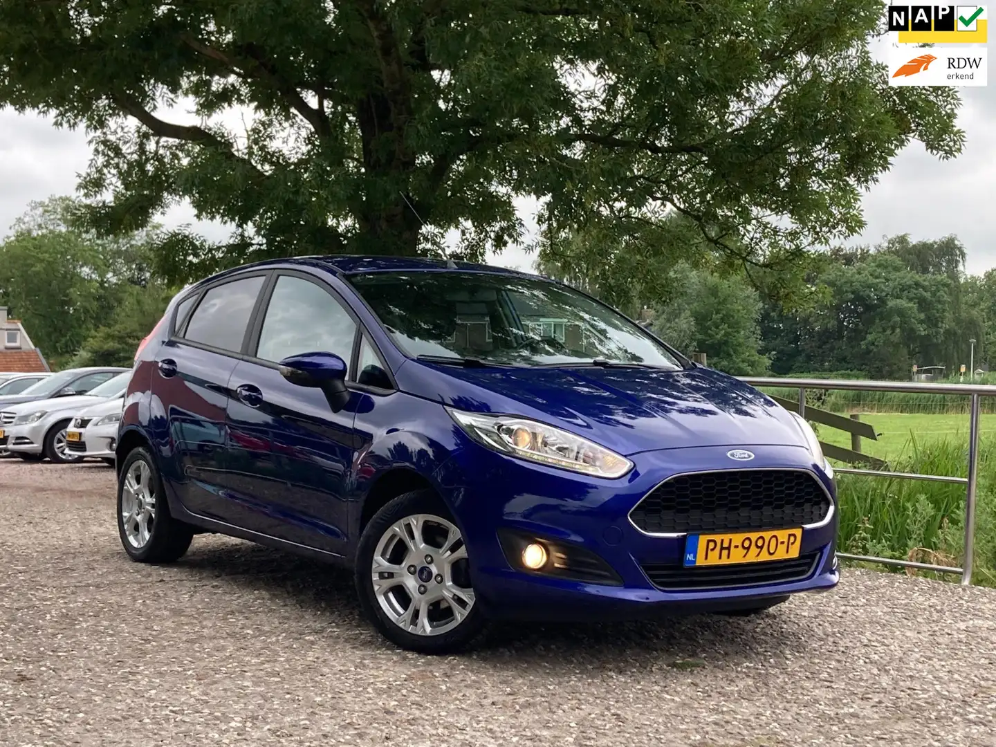 Ford Fiesta 1.0 Style Essential | Cruise + Navi + Airco nu € 6 Blauw - 1