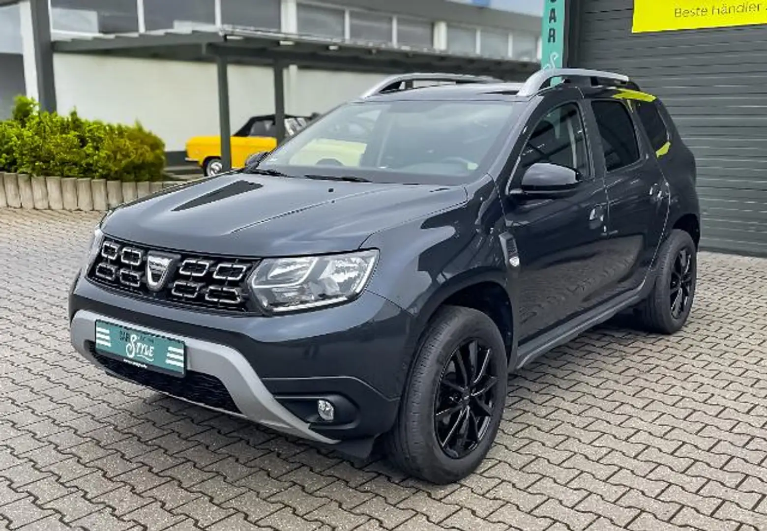 Dacia Duster II 1.0 TCe 100 LPG Celebration Navi RFK AHK Grau - 1