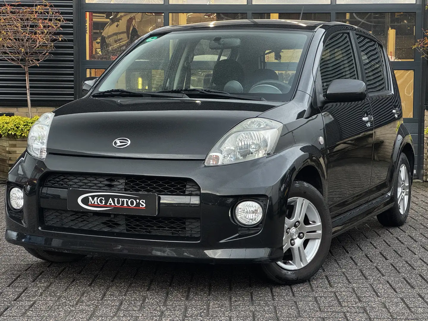 Daihatsu Sirion 1.3-16V Comfort | Nieuwe APK | Airconditioing Zwart - 1