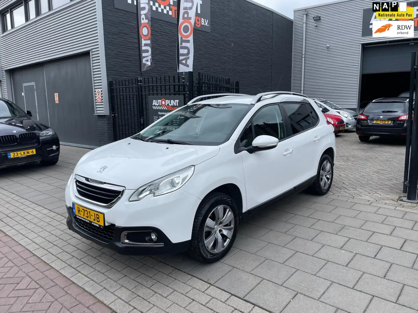 Peugeot 2008 1.2 PureTech Allure Trekhaak Navi Airco NAP APK Wit - 1