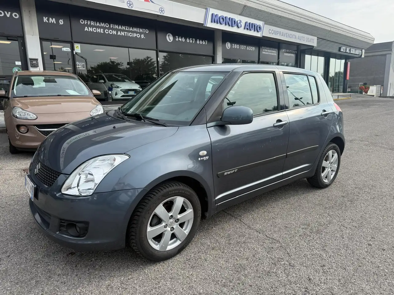 Suzuki Swift 5p 1.3 16v GL 4x4 — photo 1 of 13