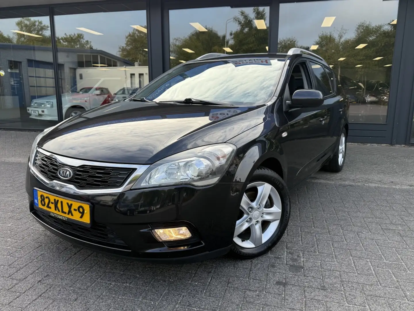 Kia Ceed / cee'd 1.4 CVVT Seven Clima Nette auto. ''Trekhaak'' Zwart - 1
