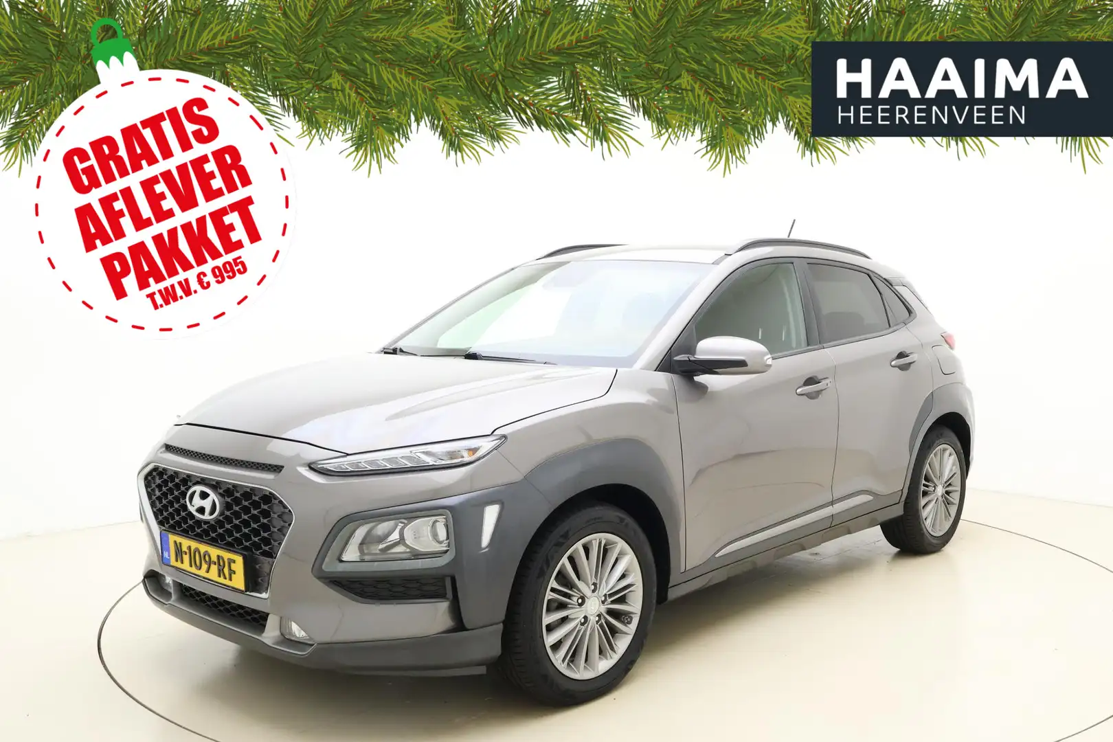 Hyundai KONA 1.0T Fashion 120 pk | Trekhaak | Climate control | Gris - 1