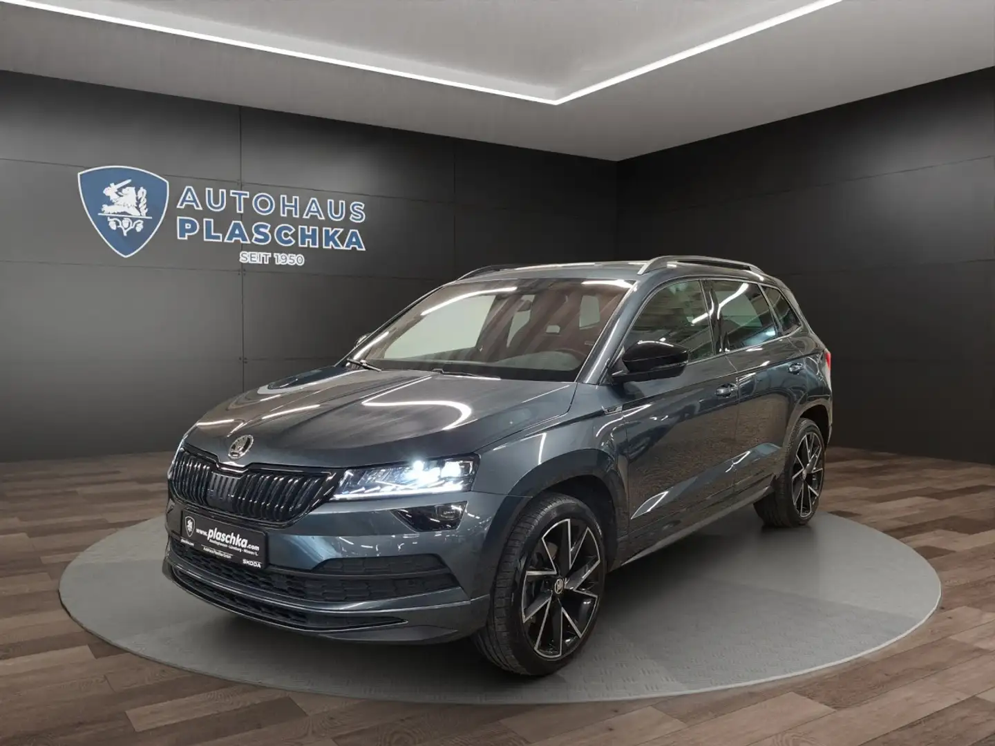 Skoda Karoq 2.0 TDI DSG Sportline 4x4 AHK+NAVI+APP Klima Navi Grau - 1