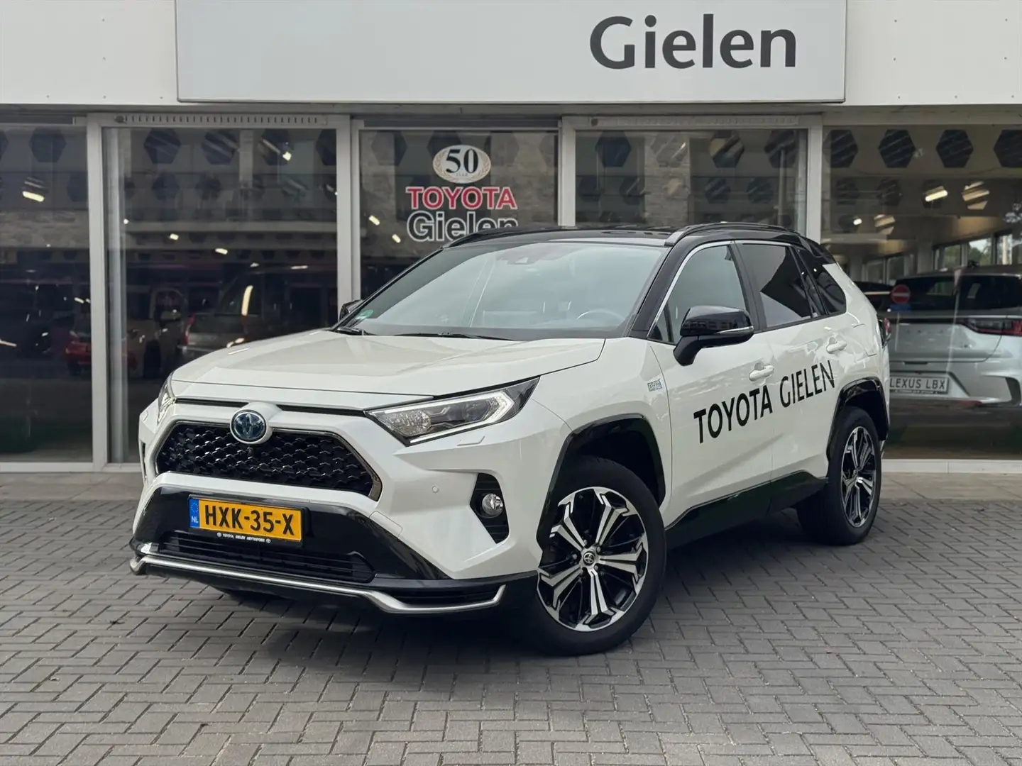 Toyota RAV 4 2.5 Plug-in Hybrid AWD Bi-Tone Plus | Head up disp Weiß - 1