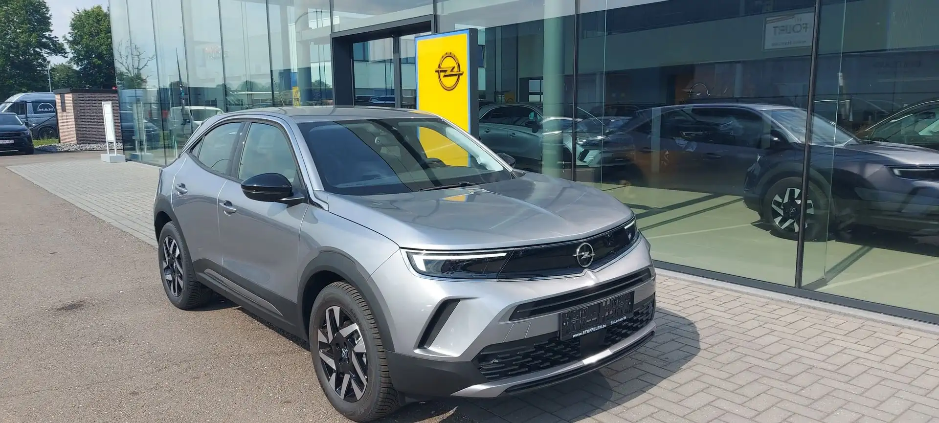 Opel Mokka Electric 50 kWh Elegance Navigatie, Camera, All s Gris - 1