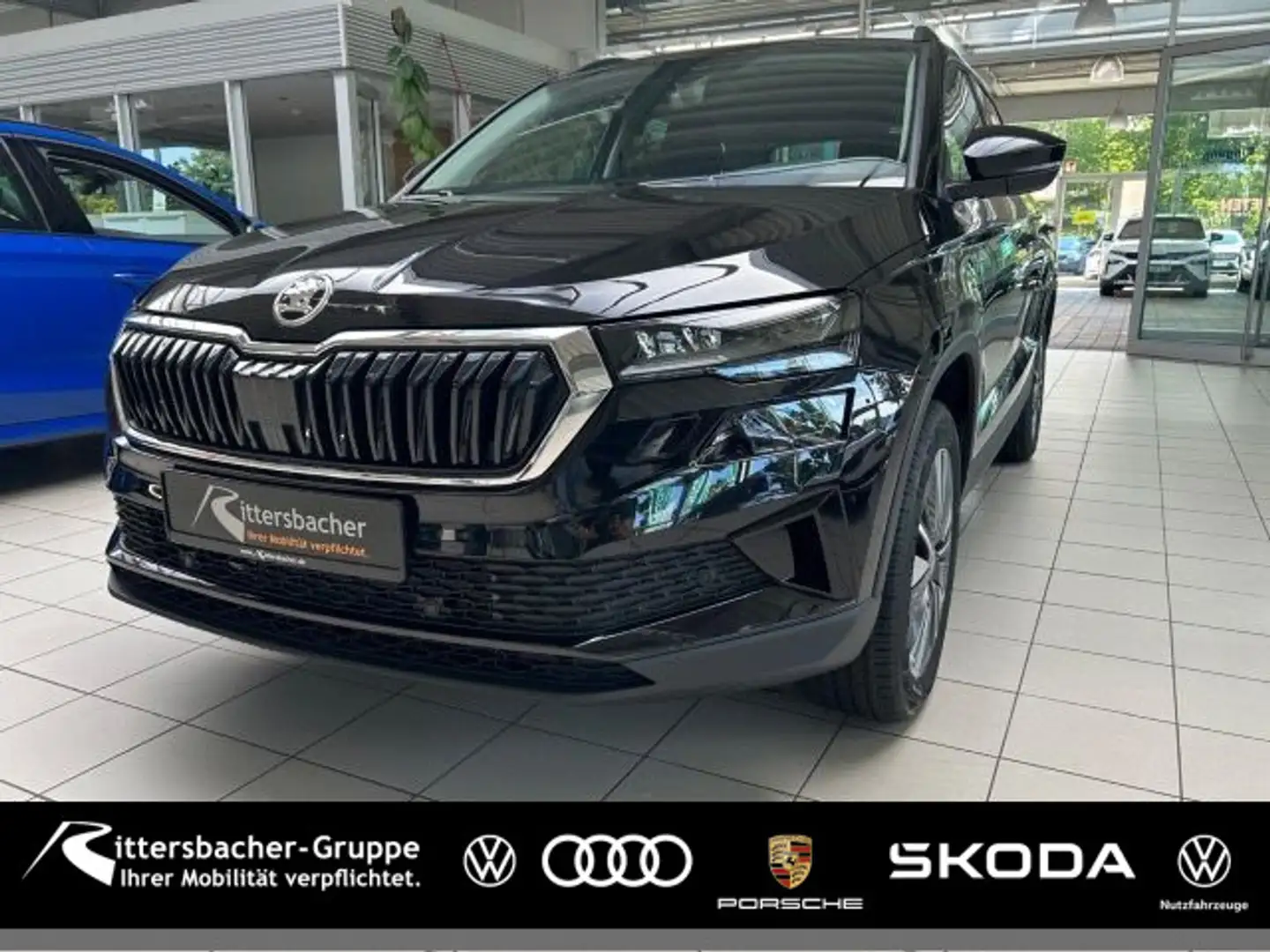 Skoda Karoq Tour 1,5 TSI 110 kW 7-Gang-DSG Verfügbar a Schwarz - 1