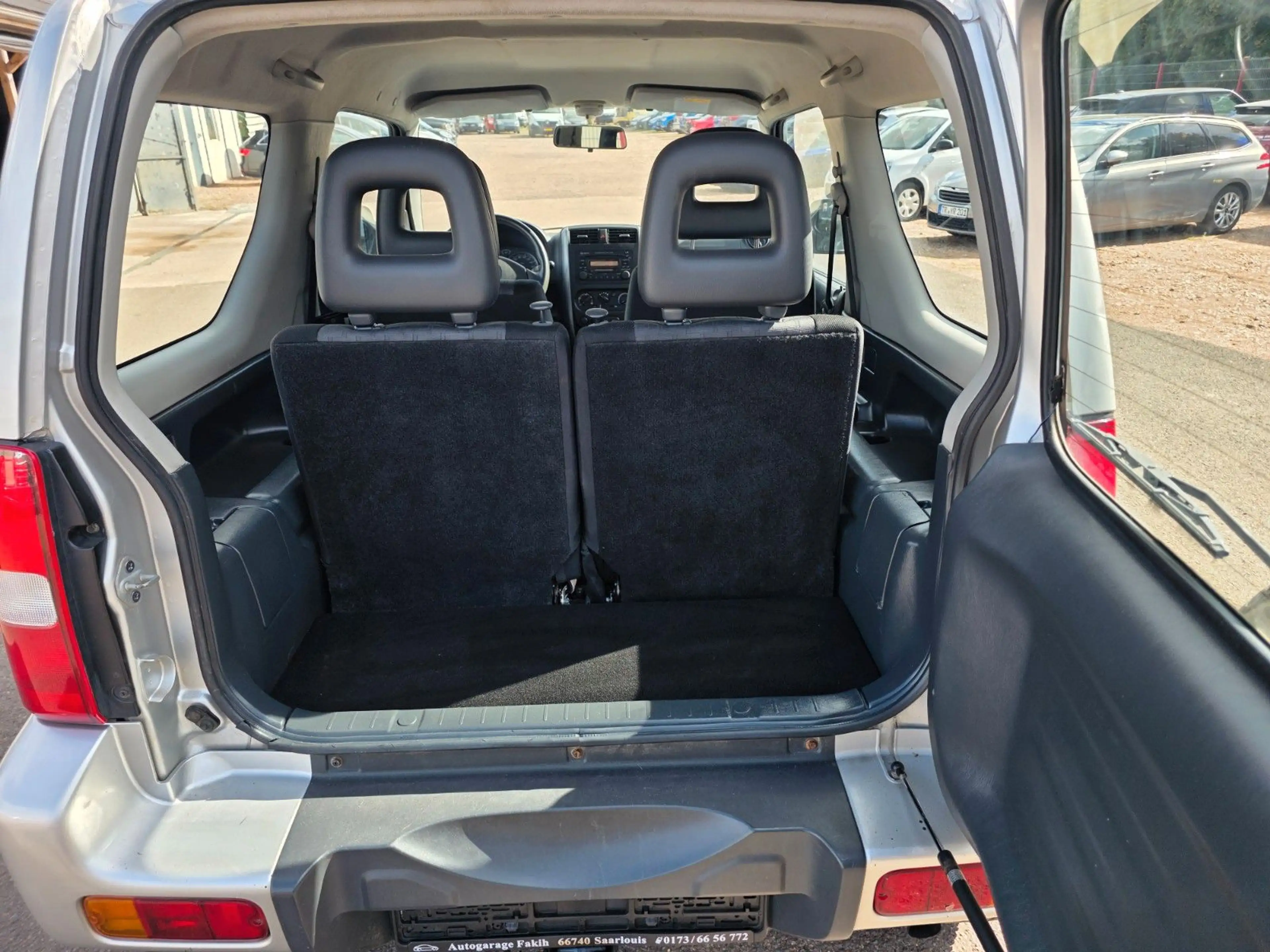 Suzuki Jimny 4x4 Automatik+AHK+Klima+TÜV neu — photo 7