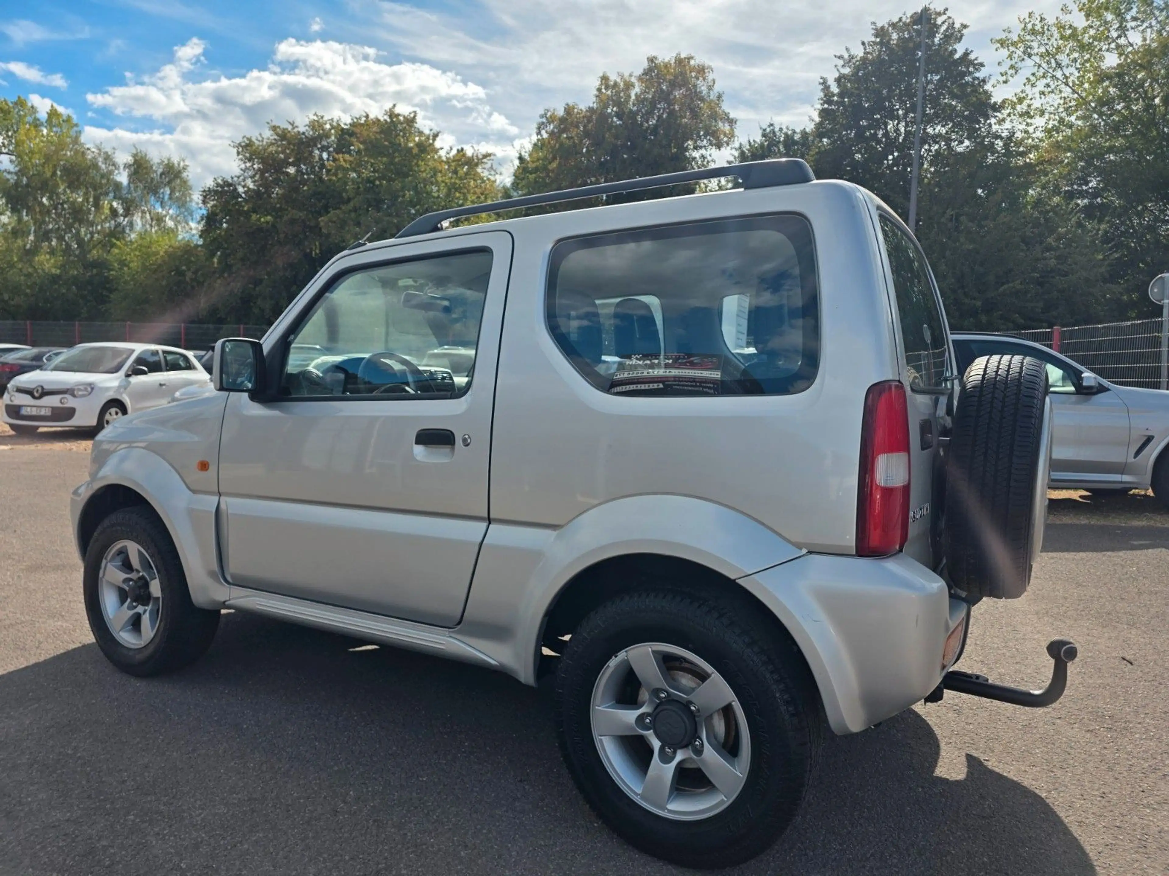 Suzuki Jimny 4x4 Automatik+AHK+Klima+TÜV neu — photo 3