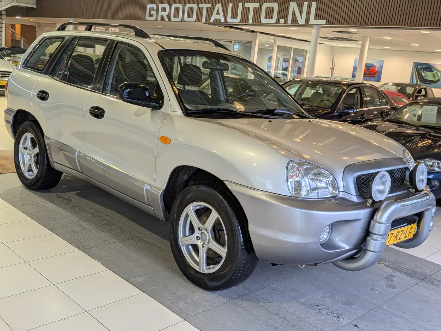 Hyundai SANTA FE 2.4i-16V 4WD Airco, Trekhaak, Stuurbekrachtiging Grau - 1