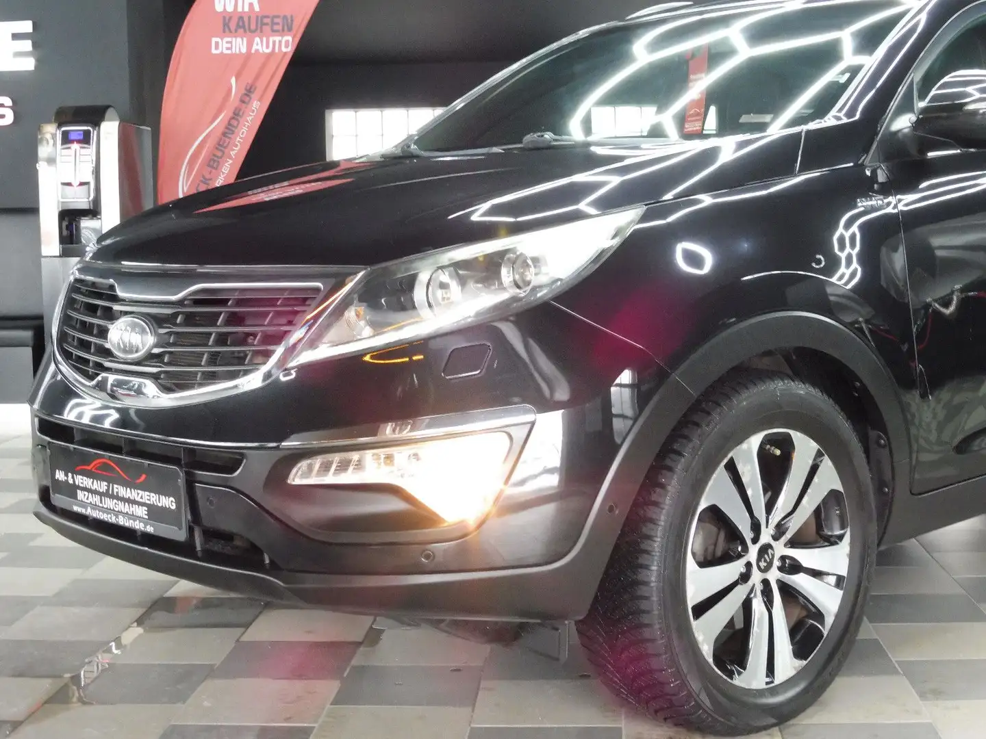 Kia Sportage 2.0 CRDi Aut/4x4/Kam/Nav/Sitz-Hz/Xenon Schwarz - 1