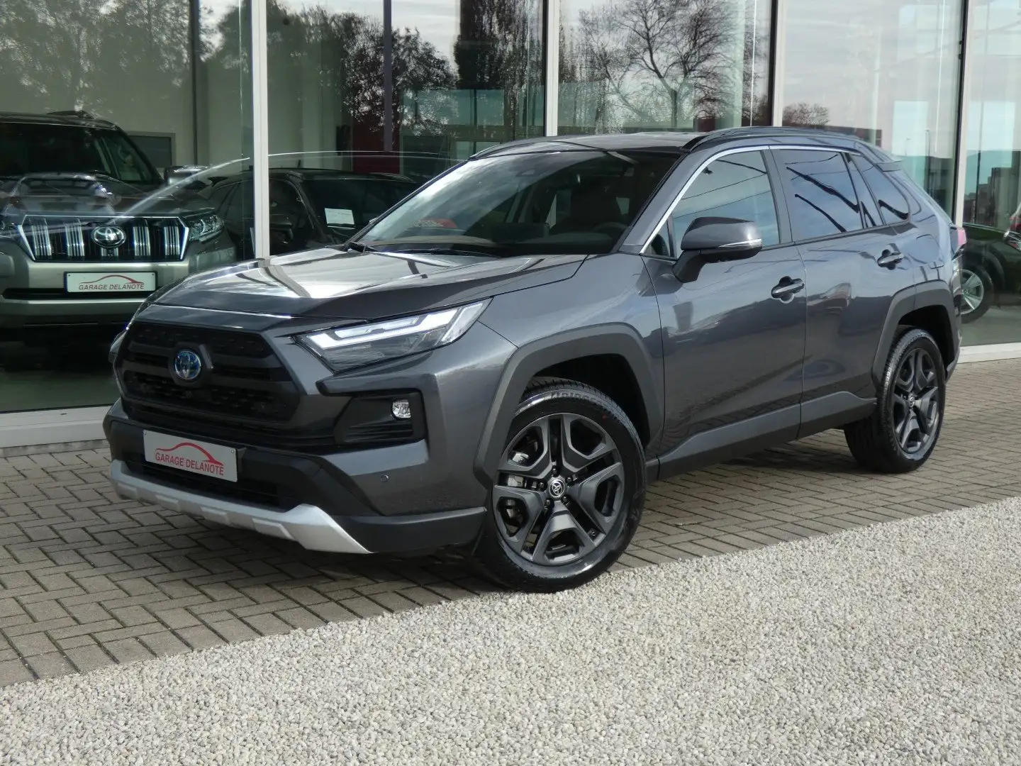 Toyota RAV 4 AWD 4x4 HYBRID ADVENTURE +Trekhaak +360°Camera Gris - 1