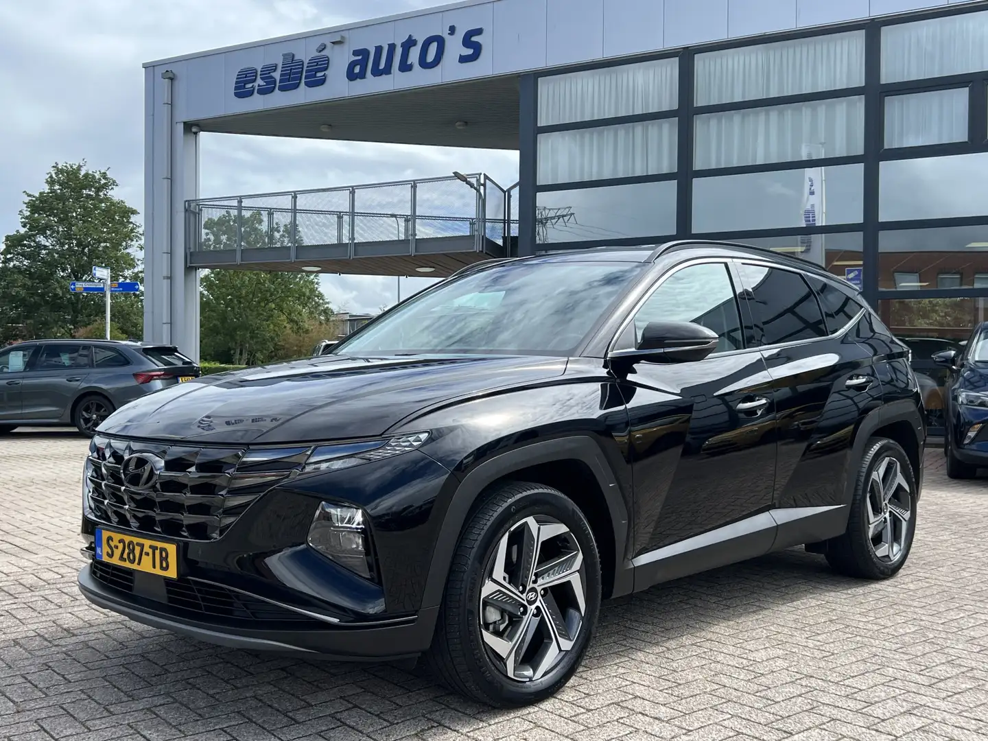 Hyundai TUCSON 1.6 T-GDI PHEV 265 pk AWD Comfort Smart Navigatie Schwarz - 1