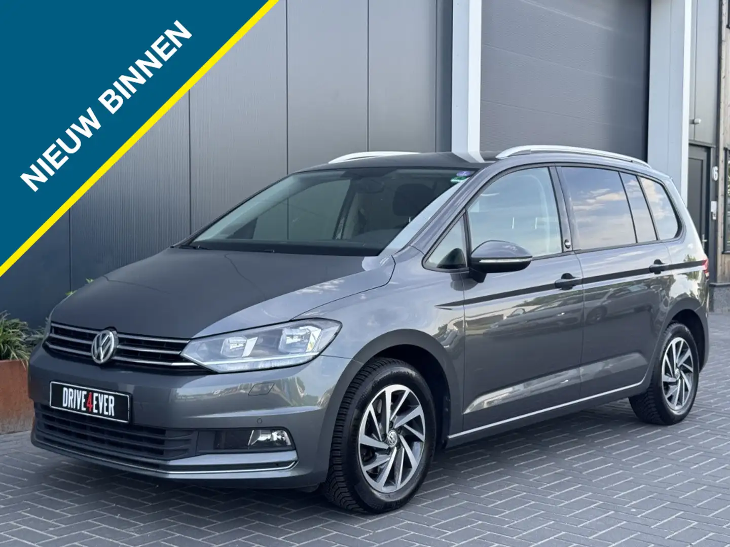 Volkswagen Touran 1.5 TSI Highline DSG TREKHAAK NAVI ACC ECC PDC LED Grau - 1