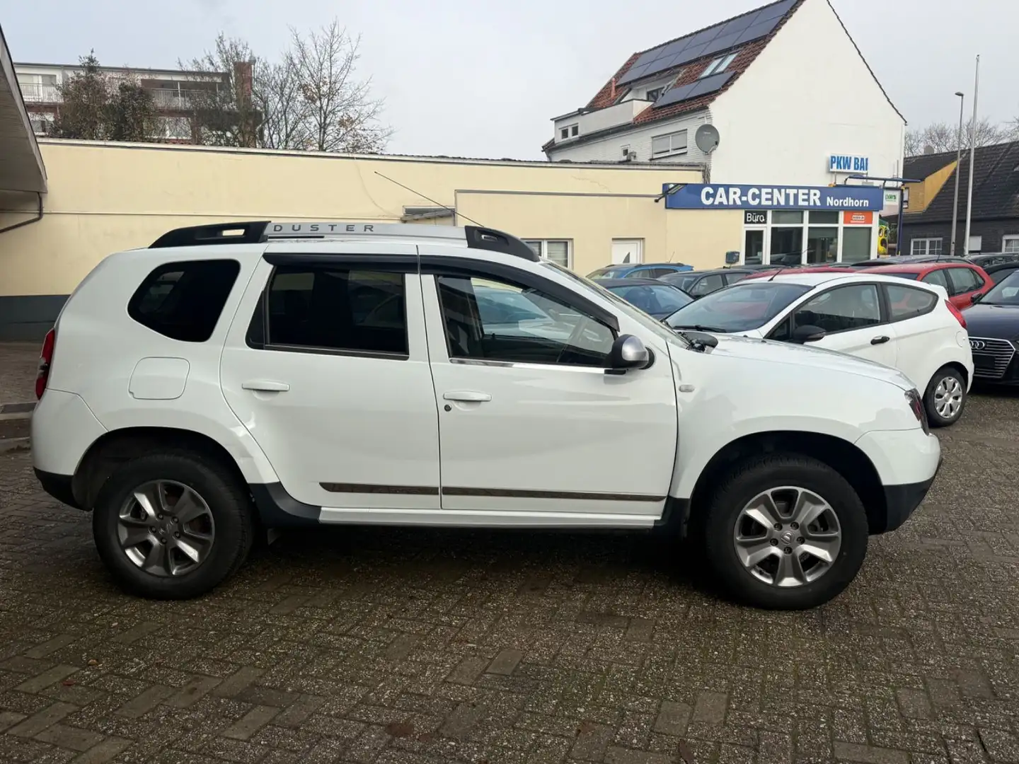 Dacia Duster I Celebration 1.6 *LPG*TEMPOMAT*MFL*KLIMA Weiß - 2