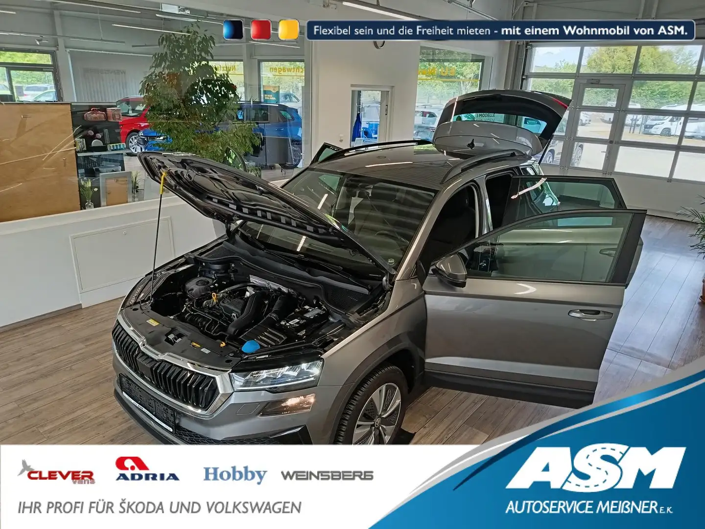 Skoda Karoq Style 1,5TSI DSG*AHK-VORBER*NAVI*LED*R-KAM Gris - 1