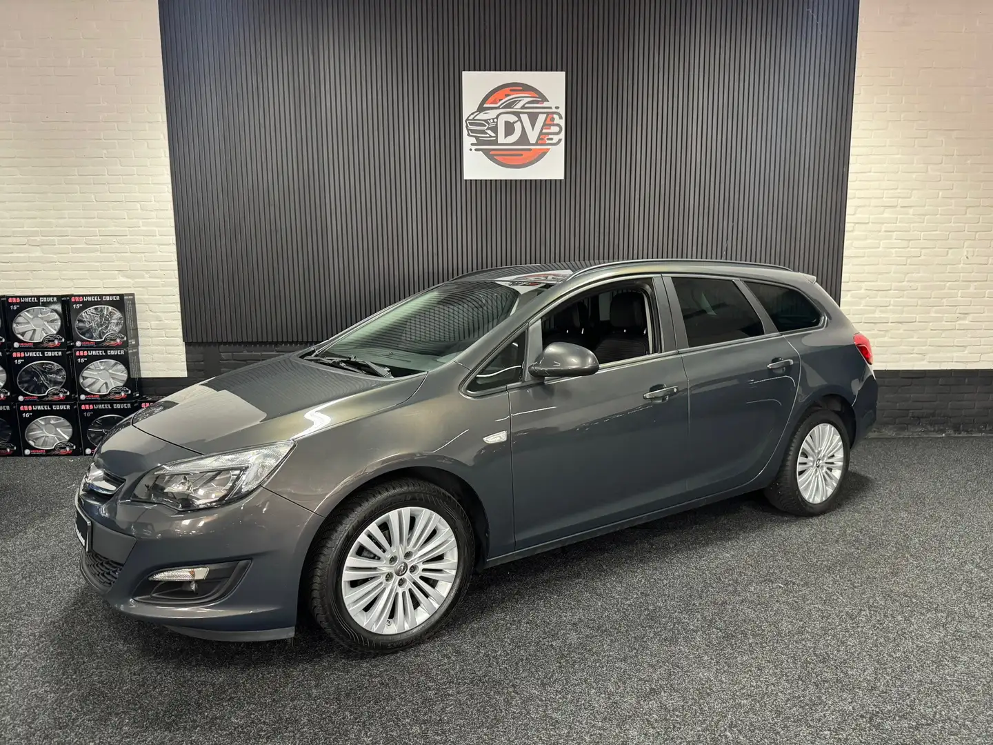 Opel Astra Sports Tourer 1.4 Edition, TREKHAAK, USB, AIRCO, E Grau - 1
