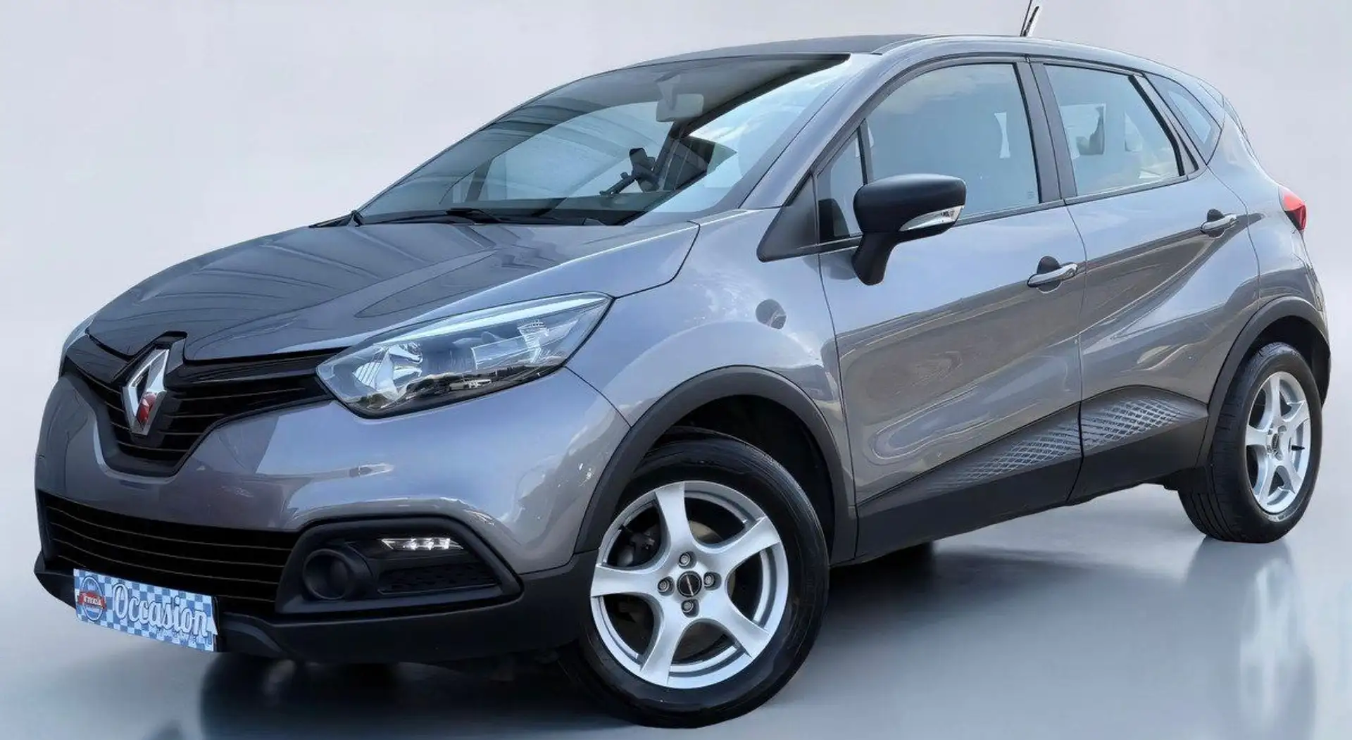 Renault Captur 0.9 TCE 90 ch (5 cv) 12V Turbo BVM5 - 5 Portes Gris Stop&Start energy Zen Euro6 %2B2015 Gris - 1