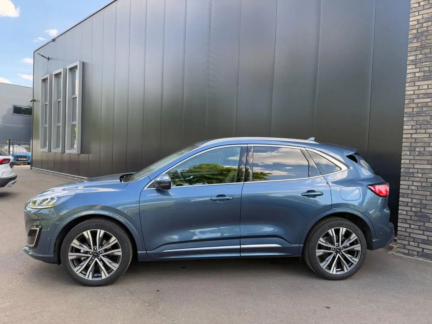 Ford Kuga 2.5 190pk FHEV Vignale Trekhaak, Winter, B&O, HUD Blauw - 2
