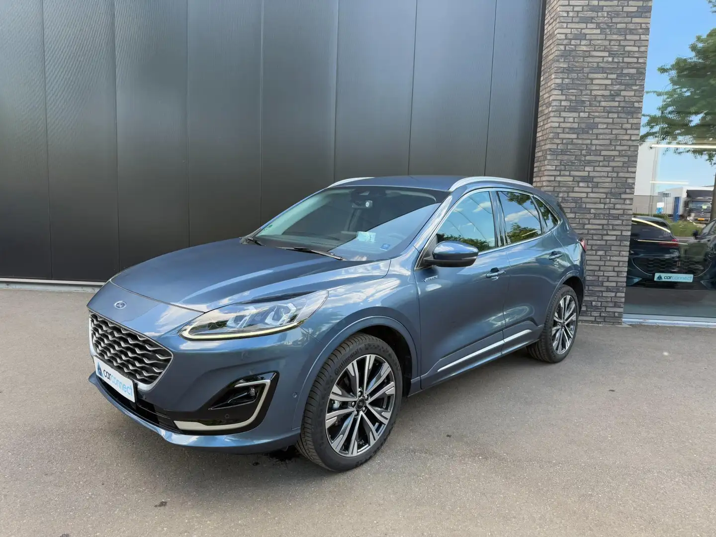 Ford Kuga 2.5 190pk FHEV Vignale Trekhaak, Winter, B&O, HUD Blauw - 1