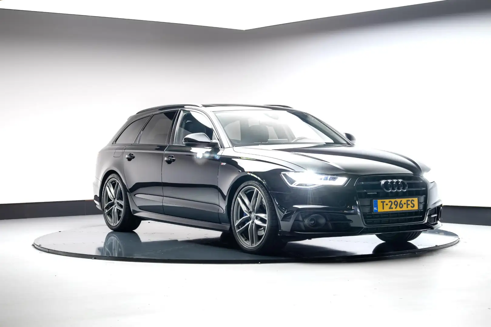 Audi A6 Avant 2.0 TFSI quattro Advance Sport Zwart - 1