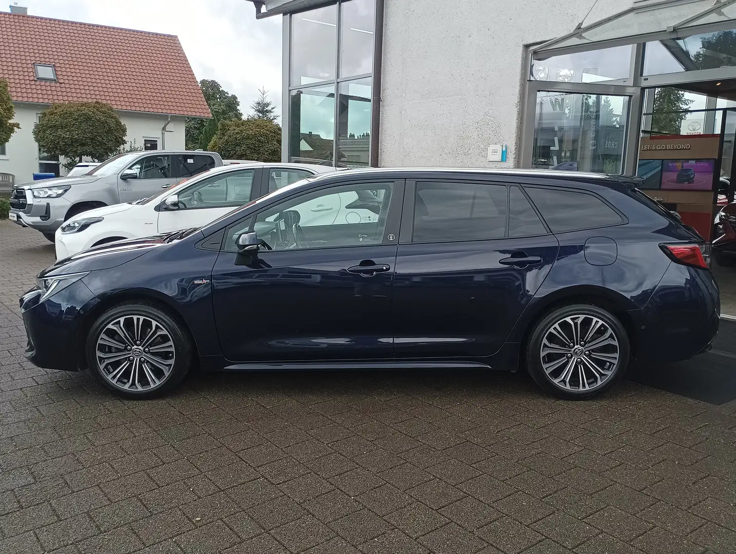 Toyota Corolla TS 2.0 Hybrid  * Team D * Technik-Paket *AHK *Navi Blau - 2