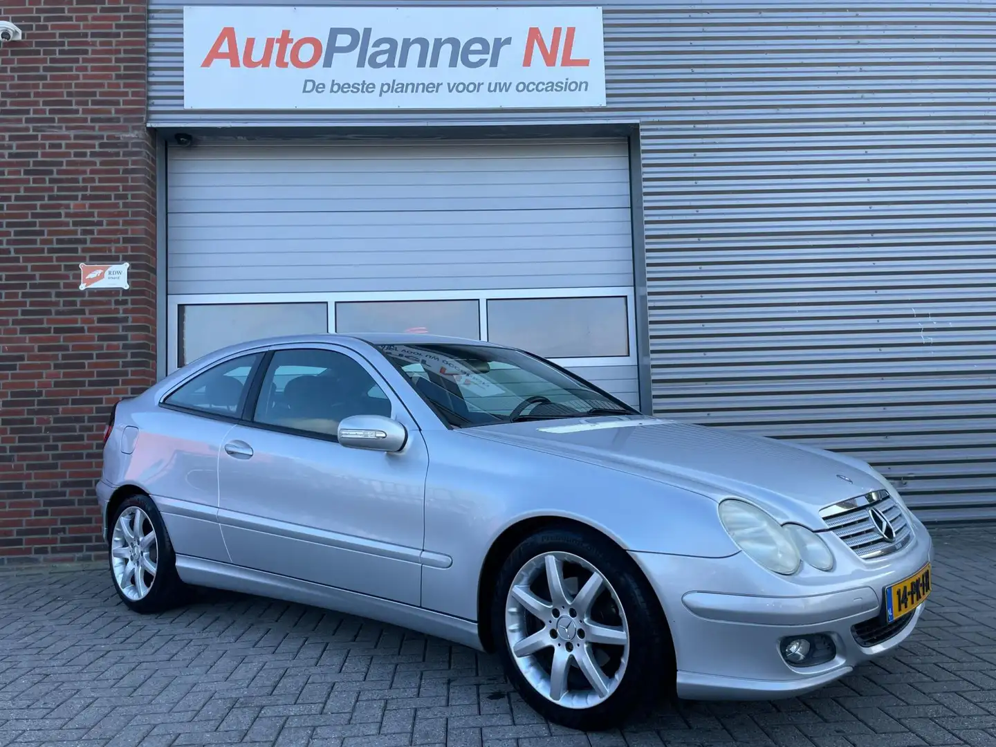 Mercedes-Benz C 180 Sportcoupé Kompressor! 1e Eigen.! Grijs - 1