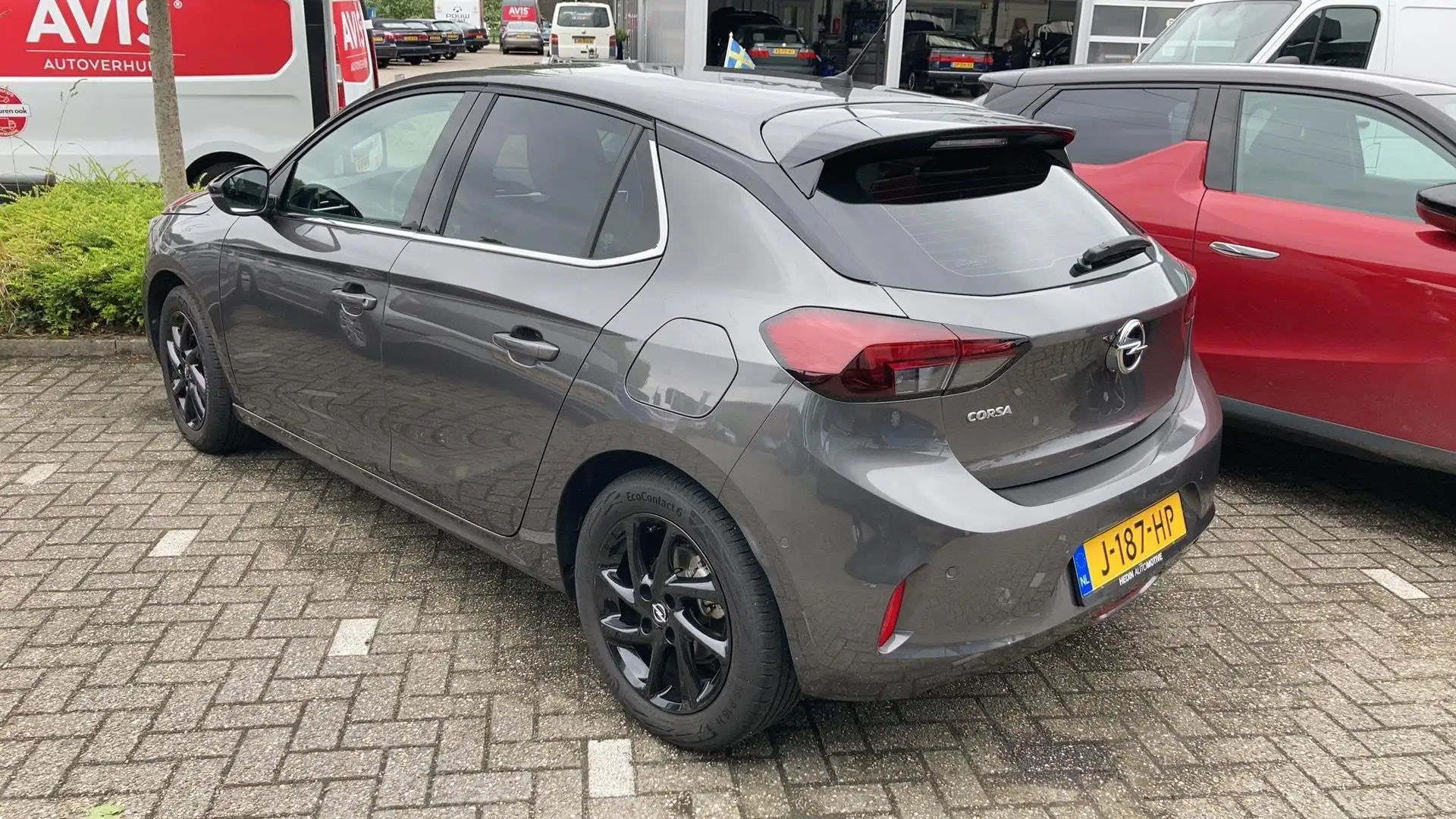Opel Corsa 1.2 100pk Elegance | Parkeer Camera | Trekhaak | P Grijs - 1