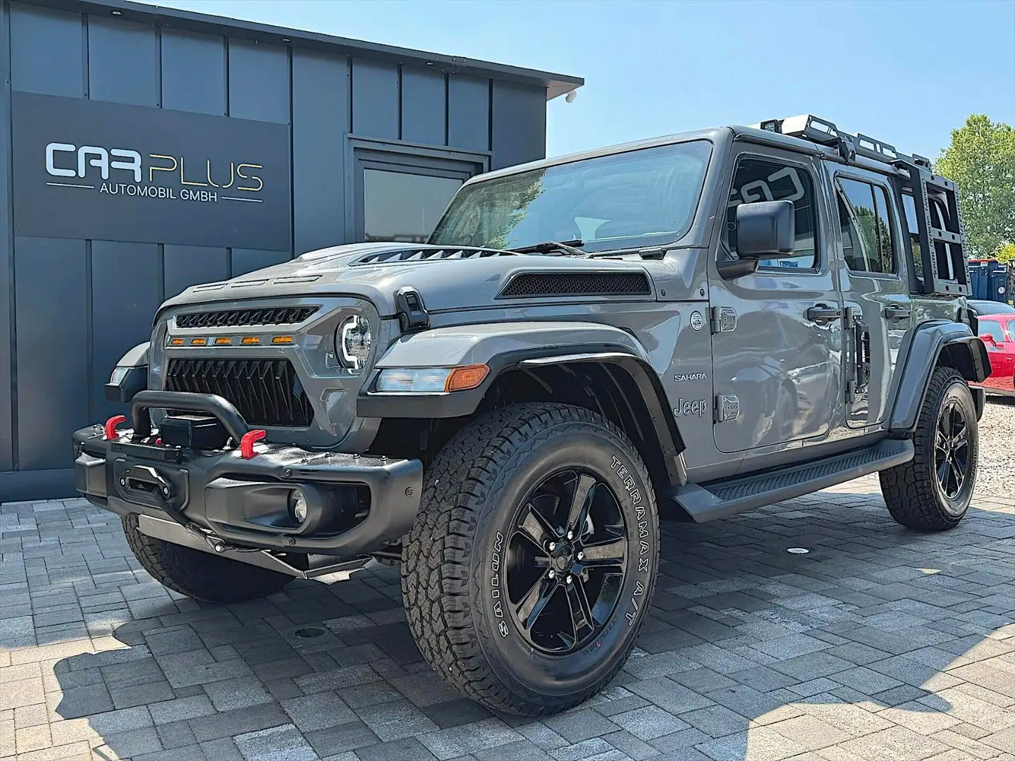 Jeep Wrangler 2.0 T Unlimited Sahara OFFROAD 4x4 19% Grau - 1