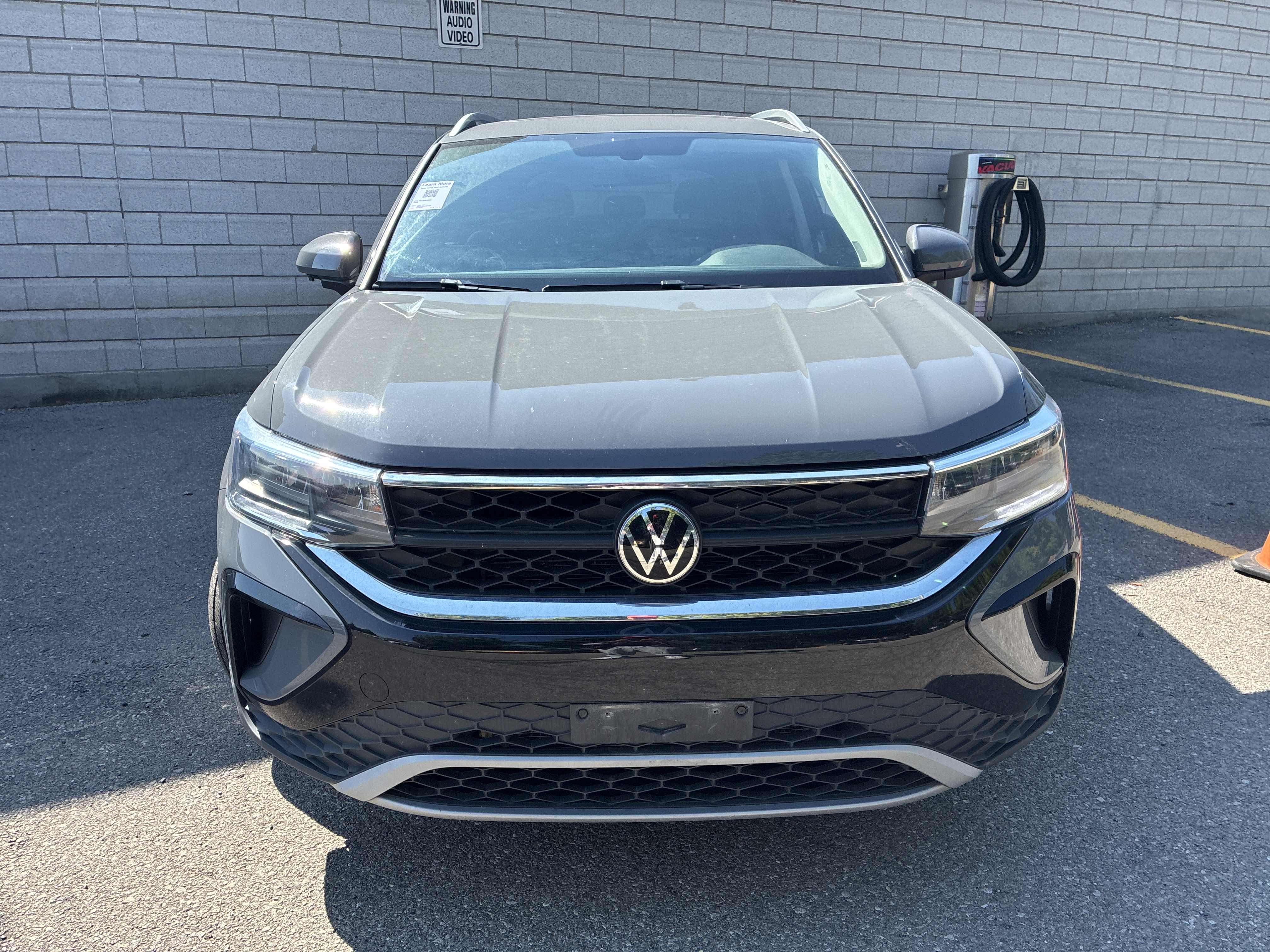 used 2022 Volkswagen Taos car, priced at $24,136
