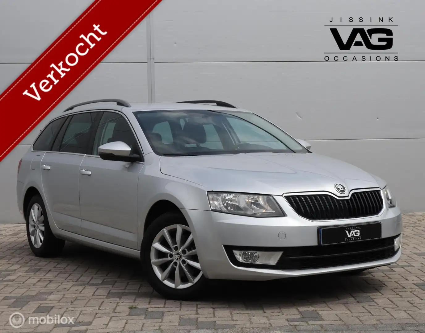 Skoda Octavia Combi 1.0 TSI Leer Navi Clima Trekhaak PDC Gris - 1