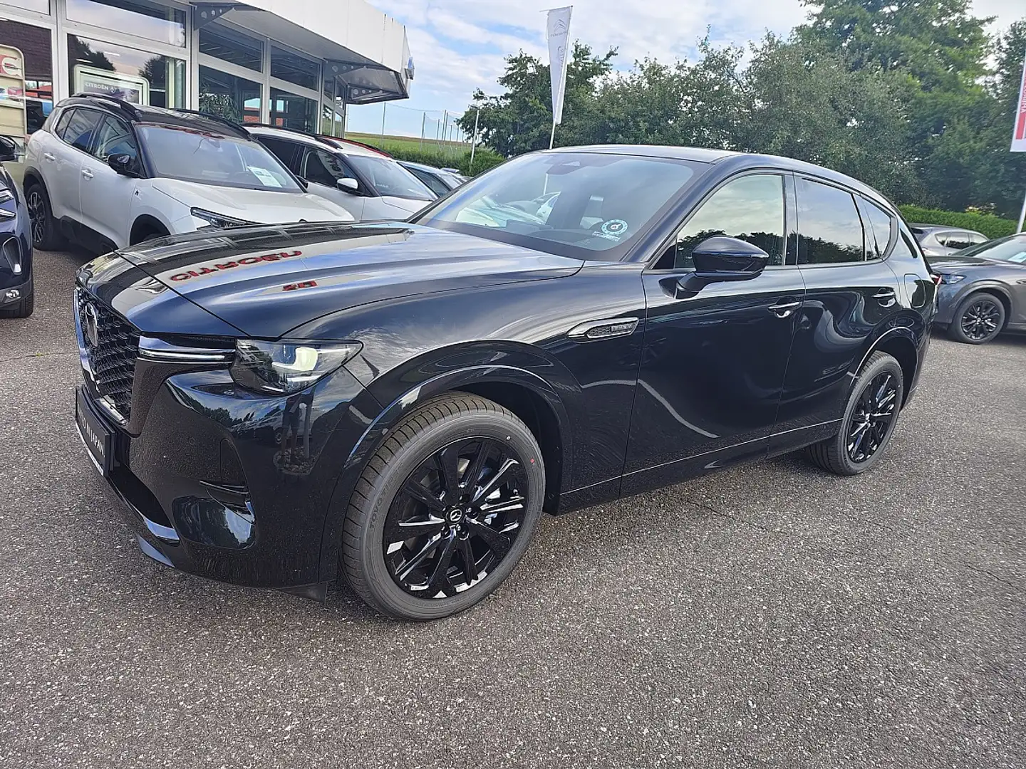 Mazda CX-60 2.5L e-SKYACTIV PHEV AWD HOMURA PLUS Automatik ... Schwarz - 1