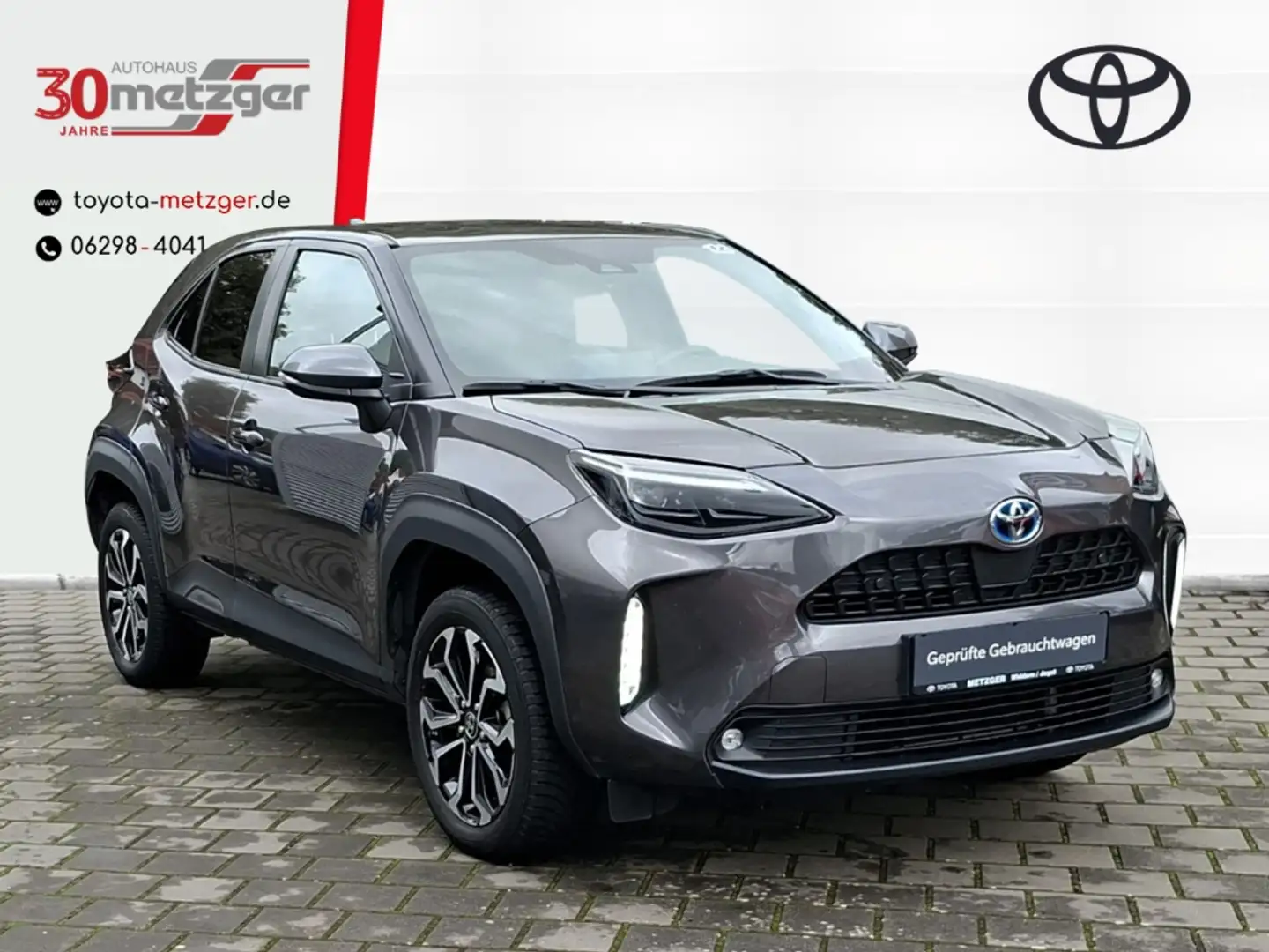 Toyota Yaris Cross 1.5 Hybrid AWD-i 4x4 Team D +Navi +Sitzheizung +El Gris - 1