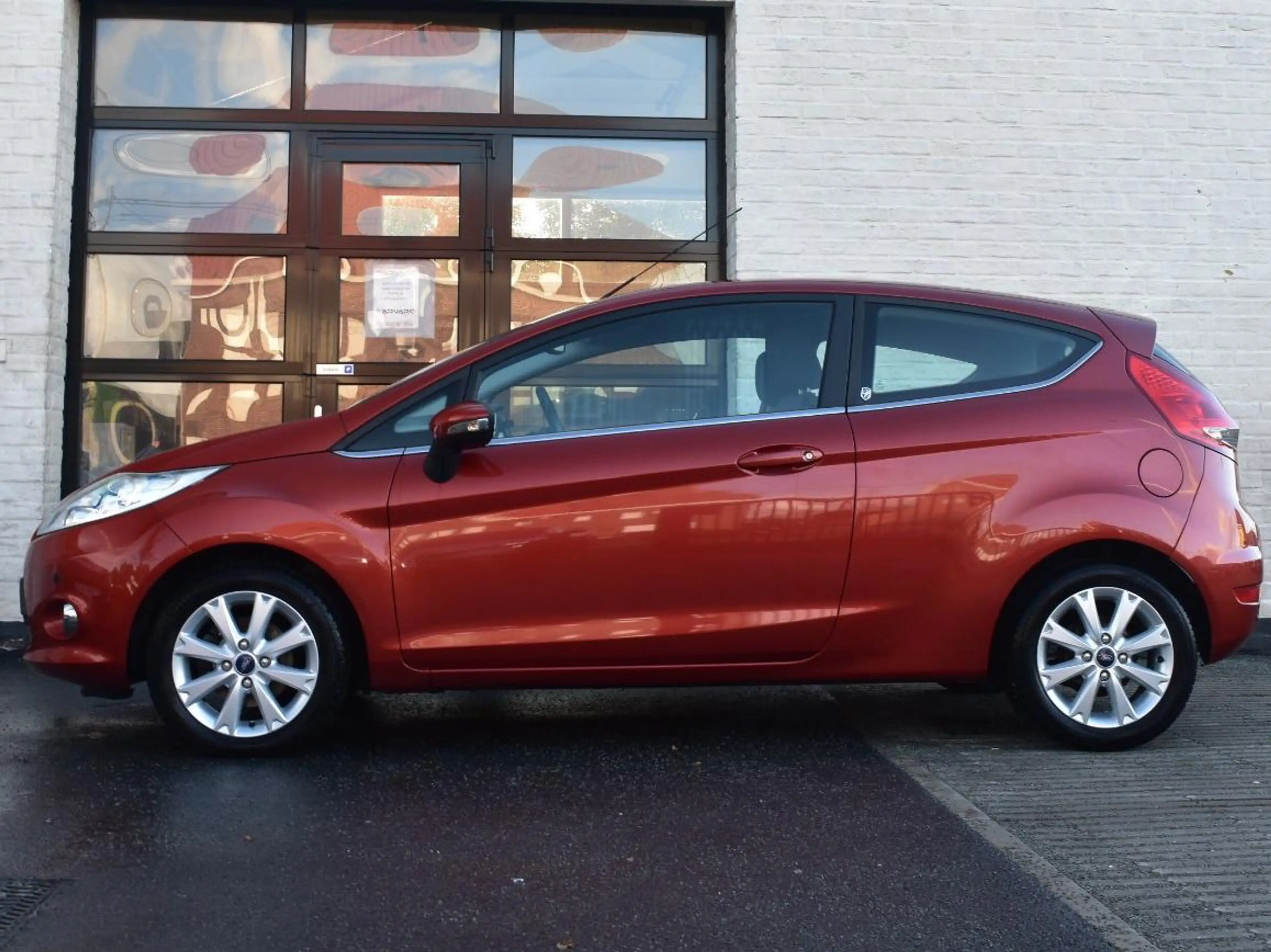 Ford Fiesta 1.25i Ghia Xenon / PDC / Airco / Topstaat / Garantie — photo 12