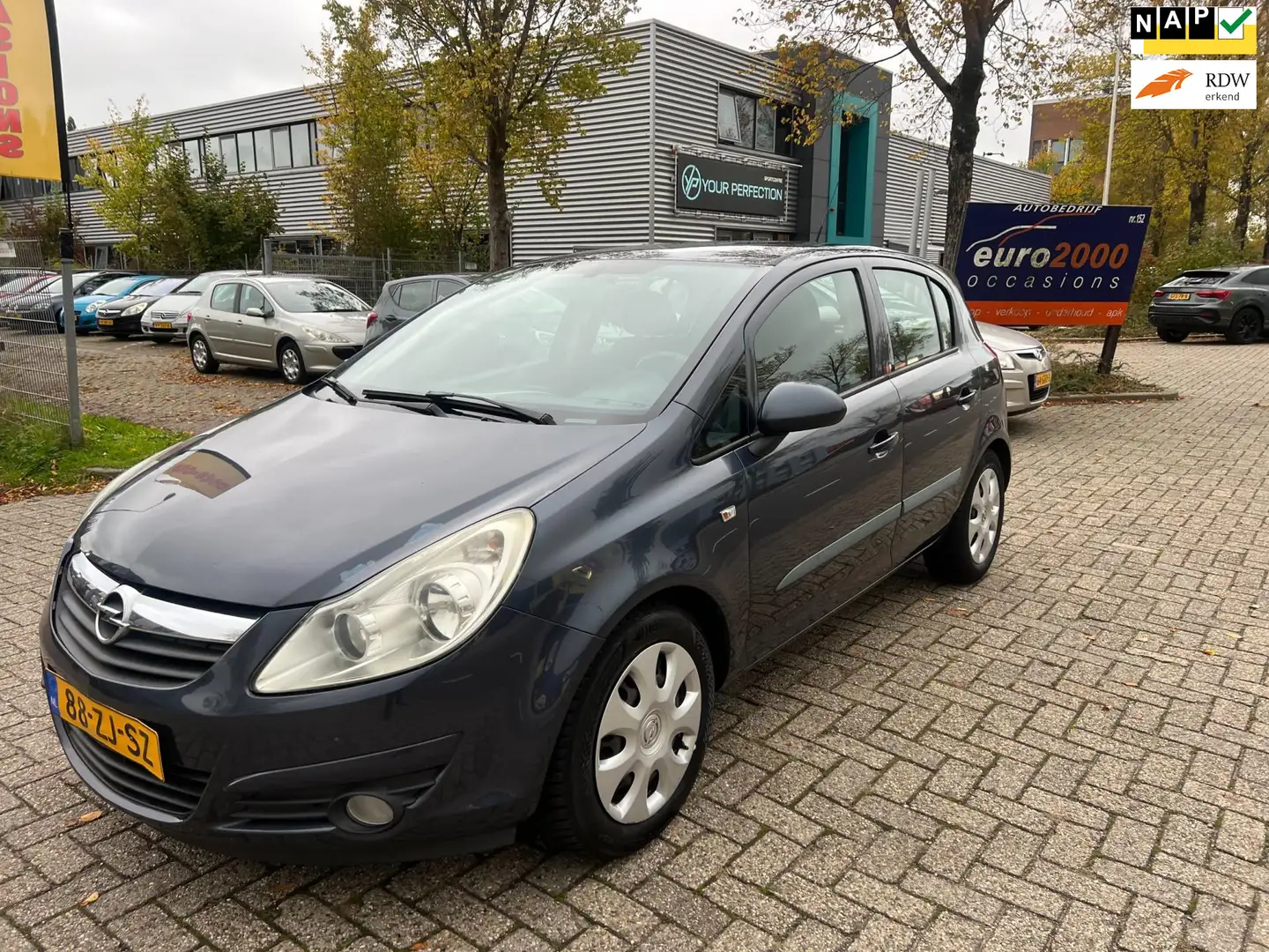 Opel Corsa 1.2-16V Enjoy - AIRCO - 5 DEURS - ZONDAG OPEN ! Grijs - 1
