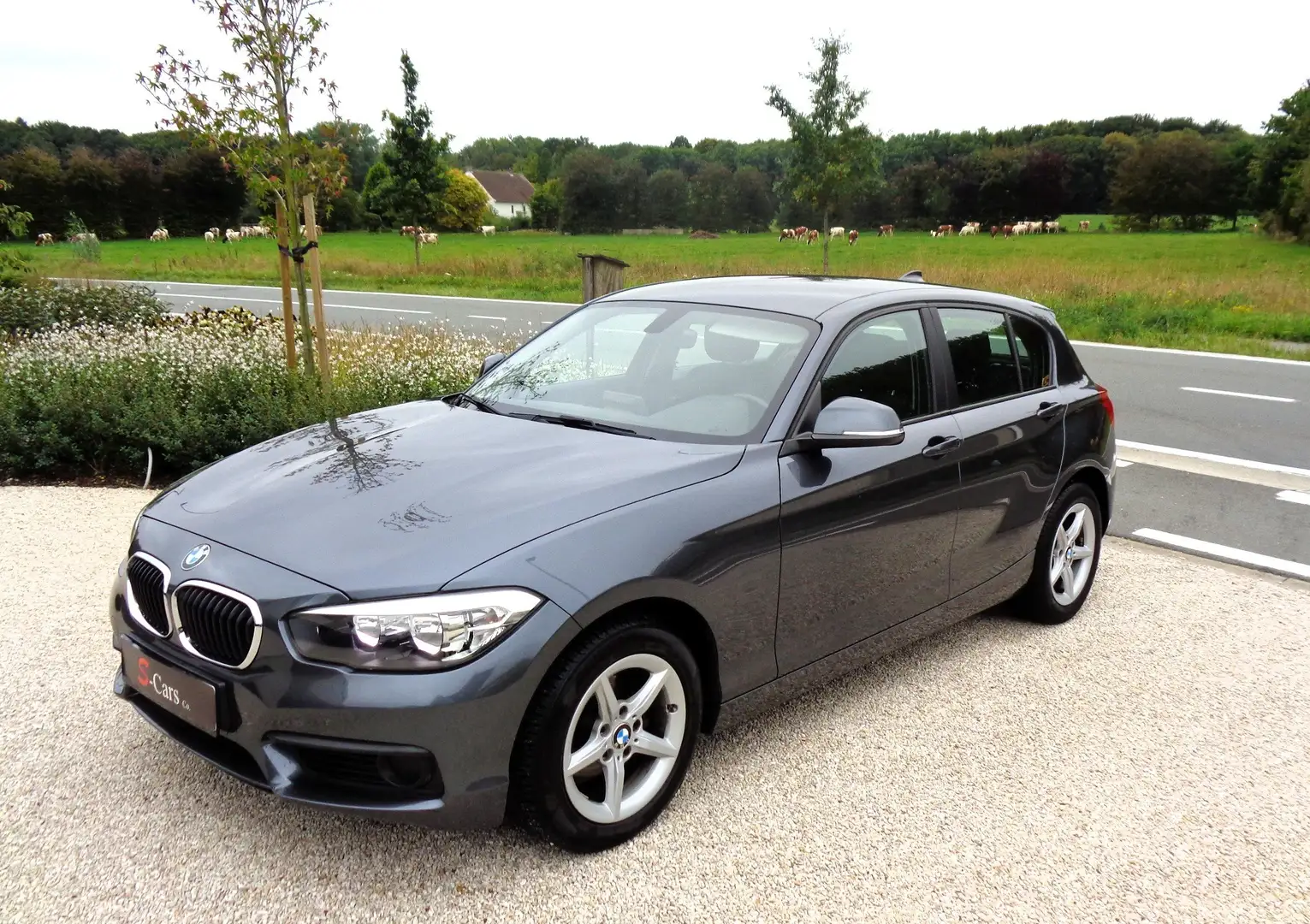 BMW 116 i/Navigatie/Sensoren/Cruise Control/Airco/Garant Grau - 1
