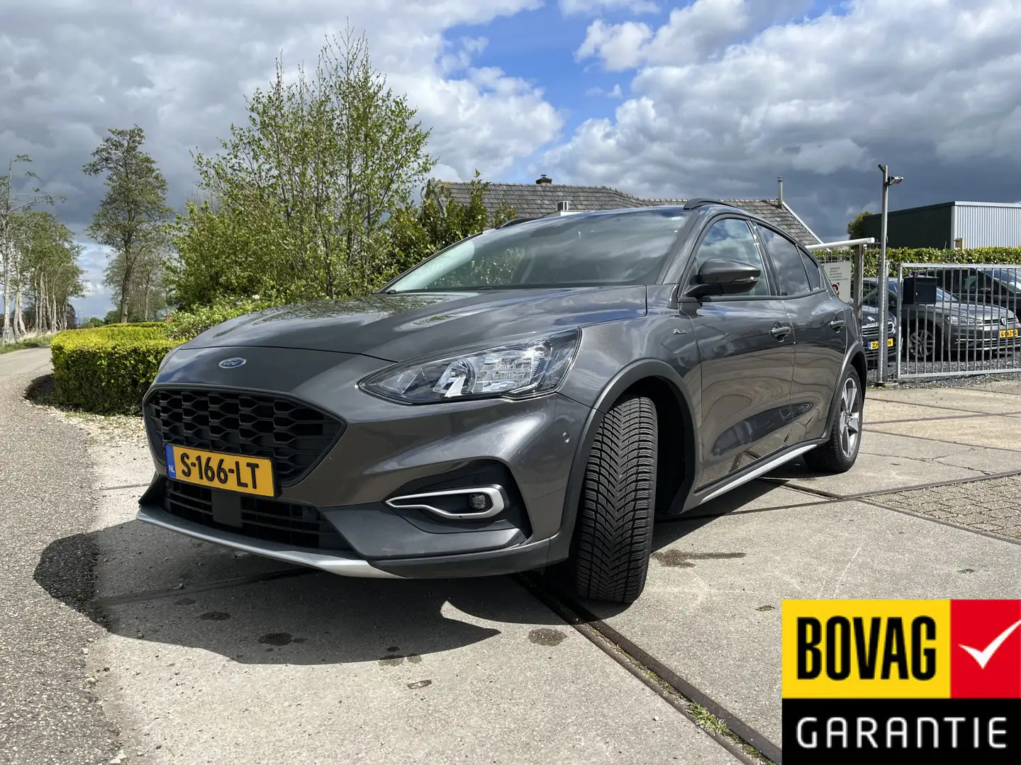 Ford Focus 1.0 EcoBoost Hybrid ST / Active X Business Voorrui Grijs - 1