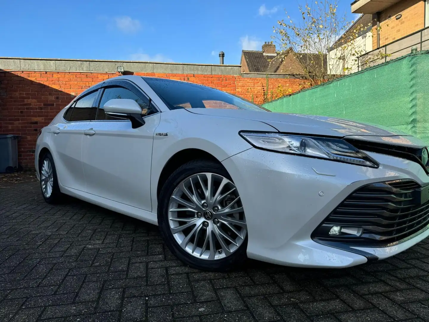Toyota Camry Camry 2.5 Hybrid e-CVT Executive Белый - 1