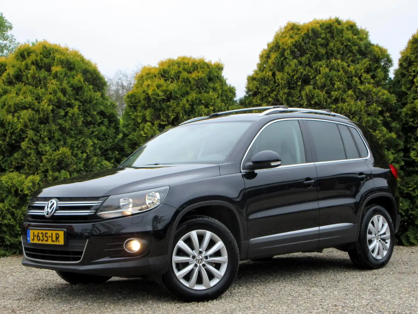Volkswagen Tiguan 1.4 TSI Sport&Style*Ecc*Cruise*Trekhaak* Zwart - 1