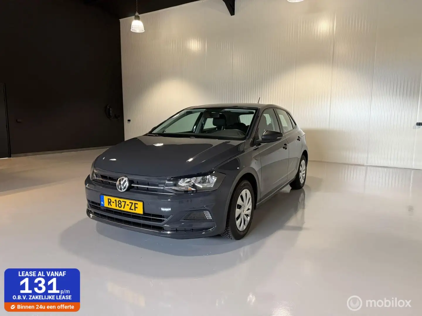 Volkswagen Polo 1.0 MPI Comfortline Business Grijs - 1