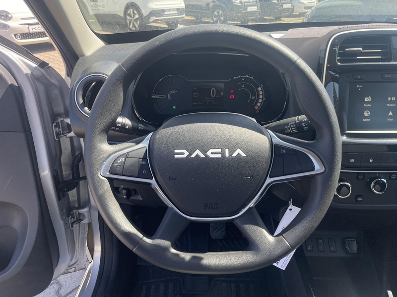 Dacia Spring Essential — photo 11